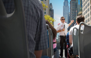 Big Bus Tour guide conducting a top deck tour in New York