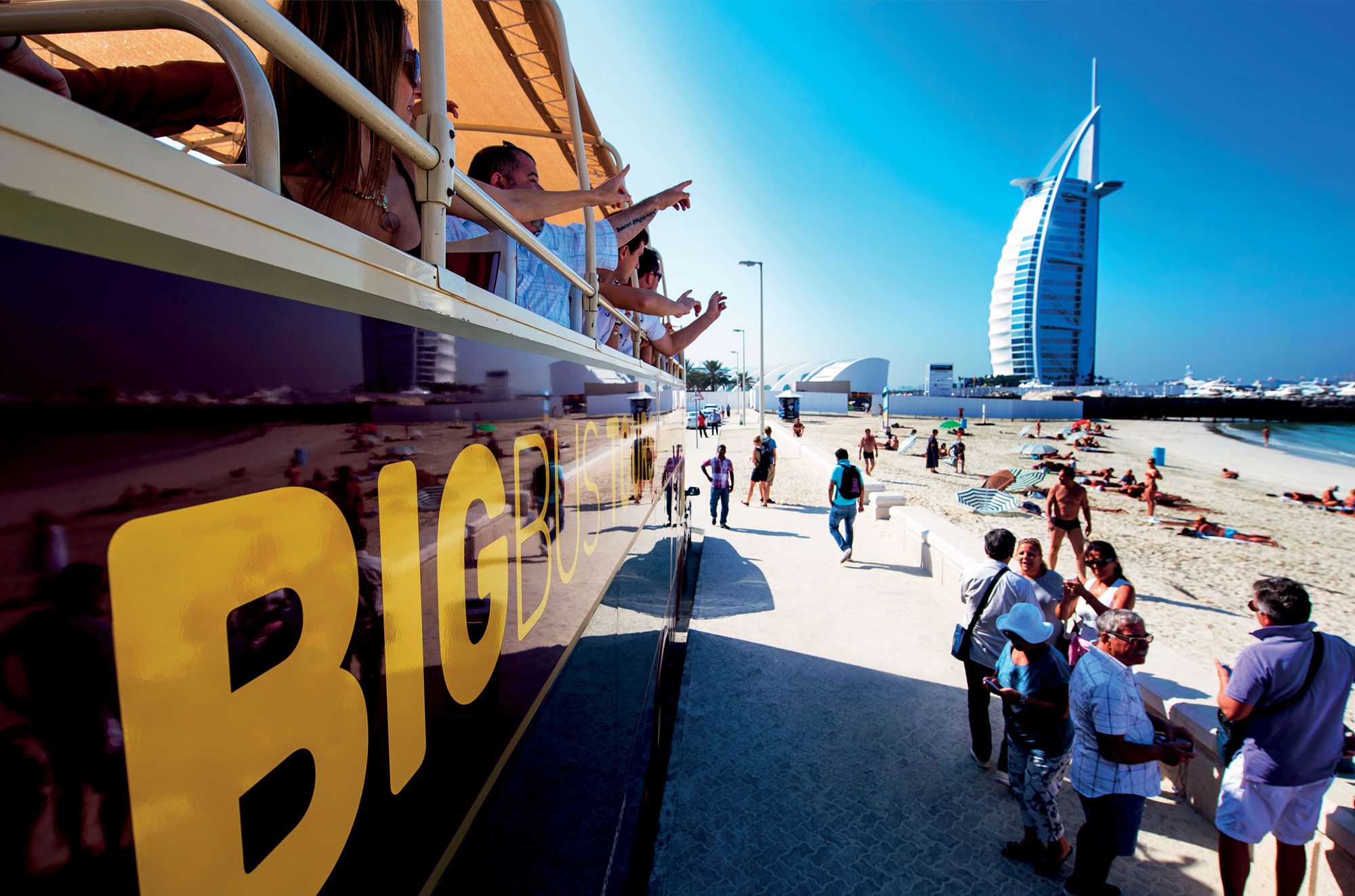 Big Bus in Dubai driving towards Burj Khalifa