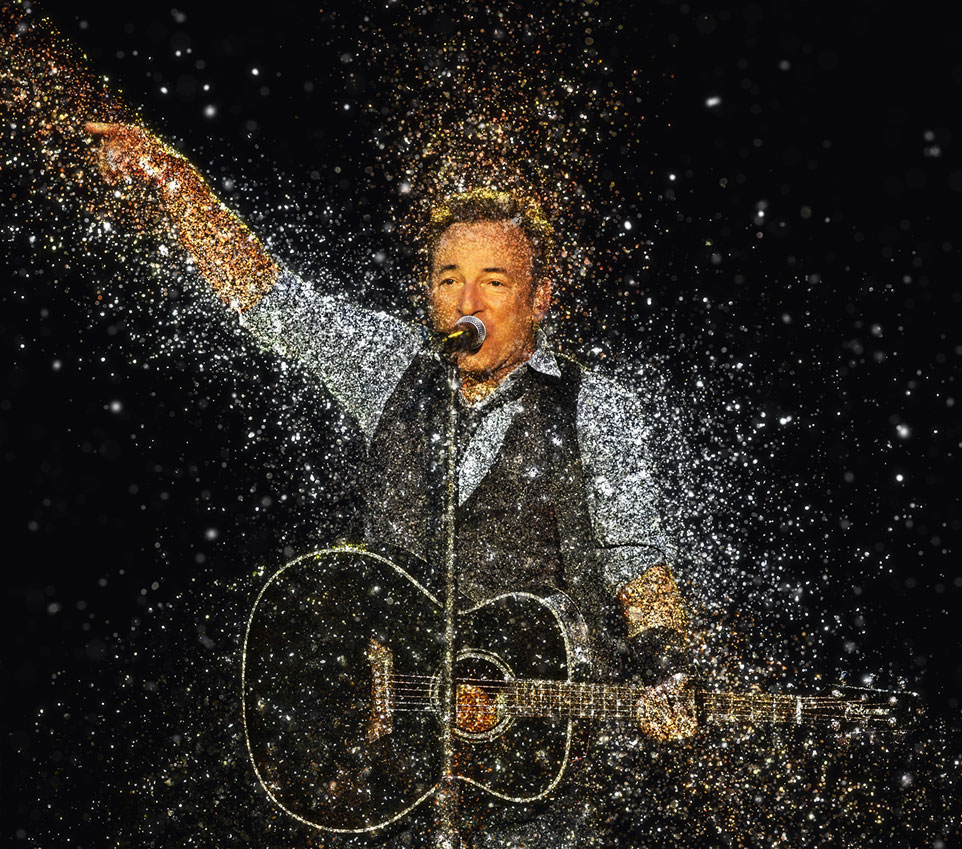 Bruce Springsteen singing on stage at Wembley