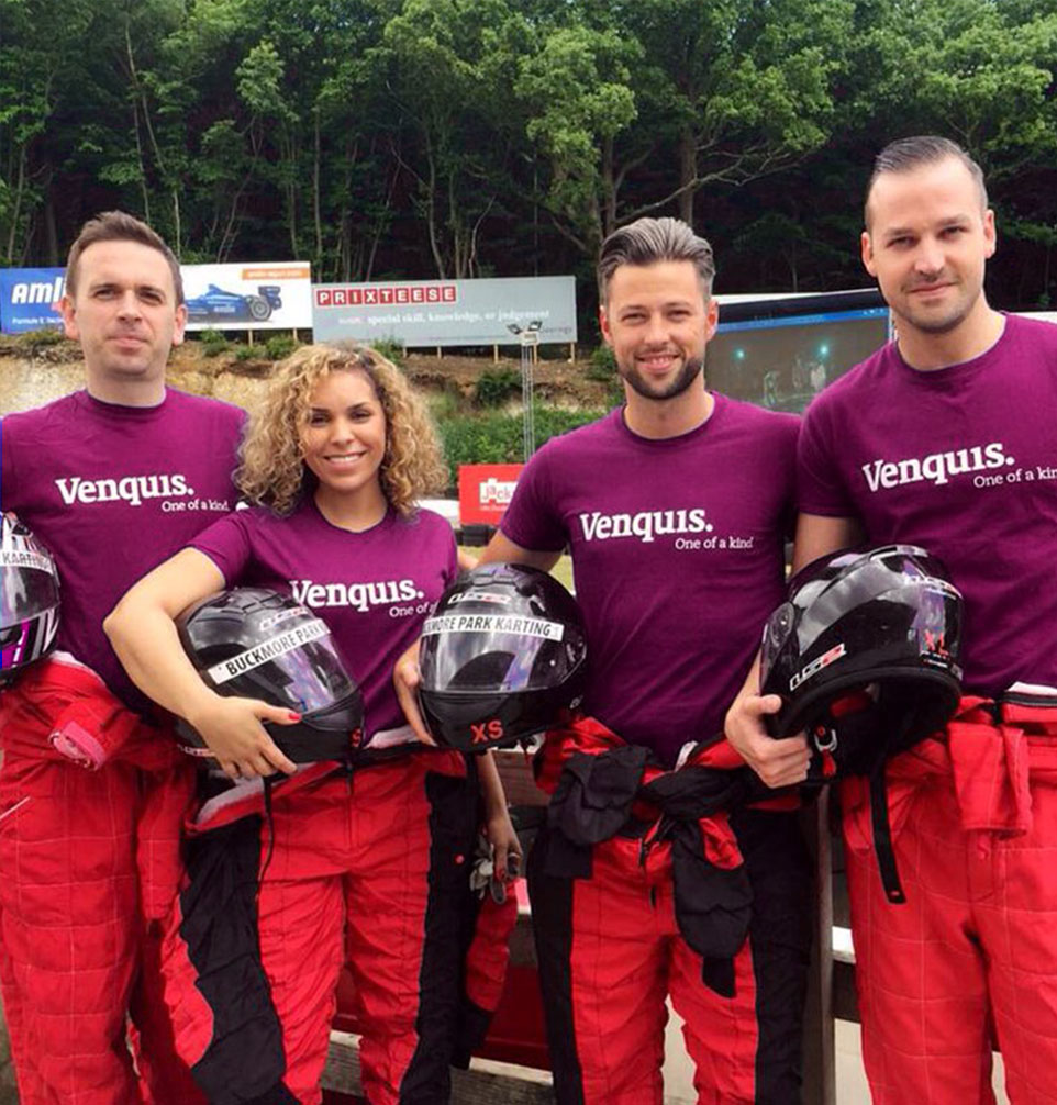 Venquis team members in branded t-shirts